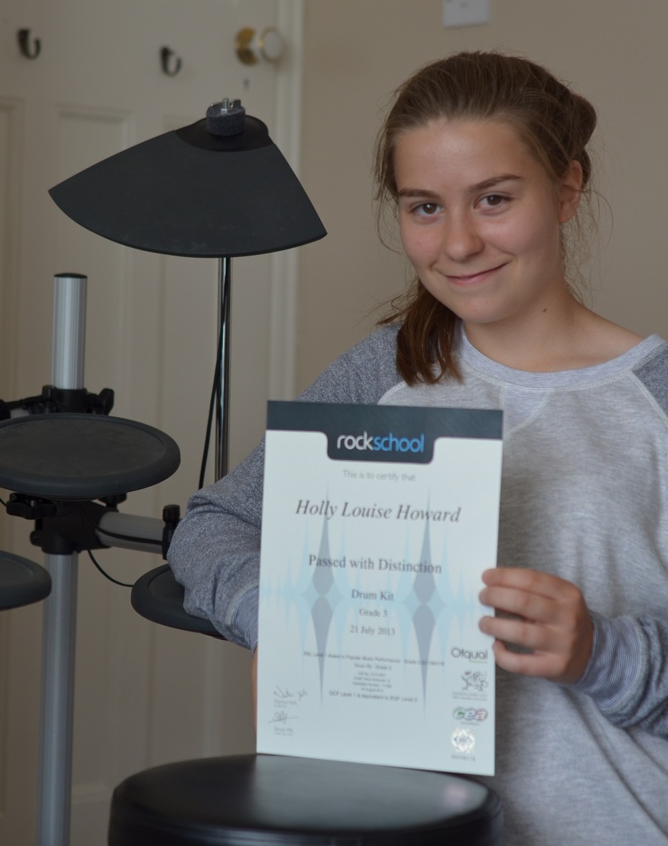 Student with Rockschool Grade success Drum lessons for adults